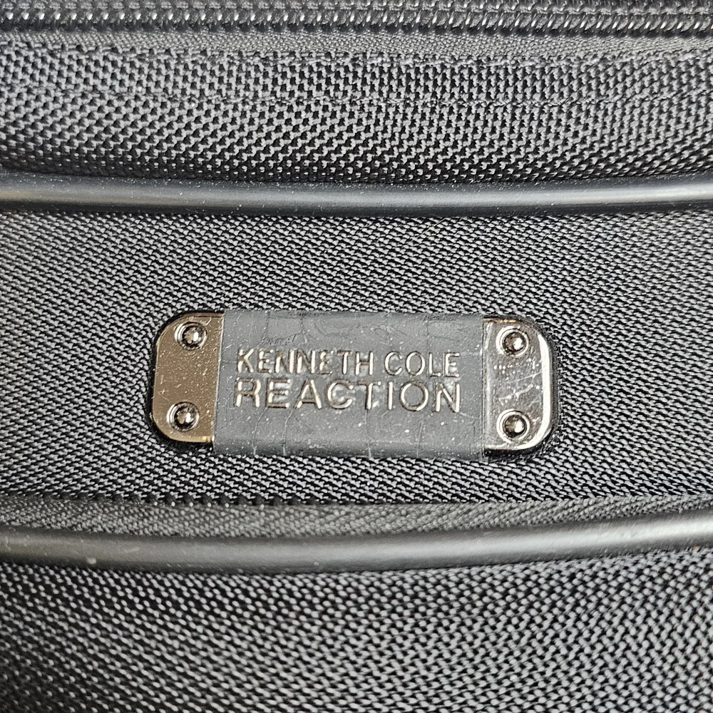 Kenneth Cole Reaction all zippers